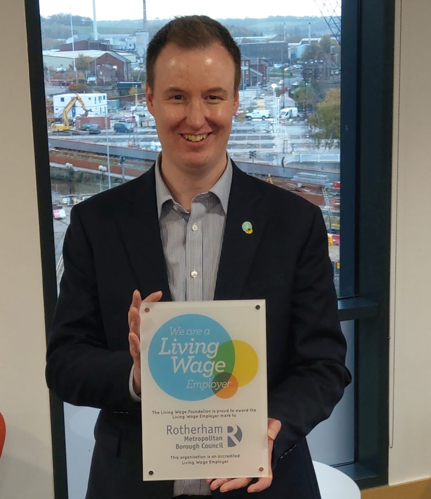 Cllr Chris Read with Living Wage accreditation plaque
